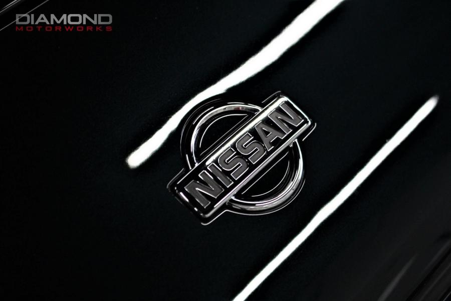 Логотип Nissan 300ZX Convertible 1994 года  (фото 25 из 66)
